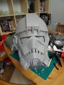 The helmet after priming - please ignore the expanding chaos of my workspace!